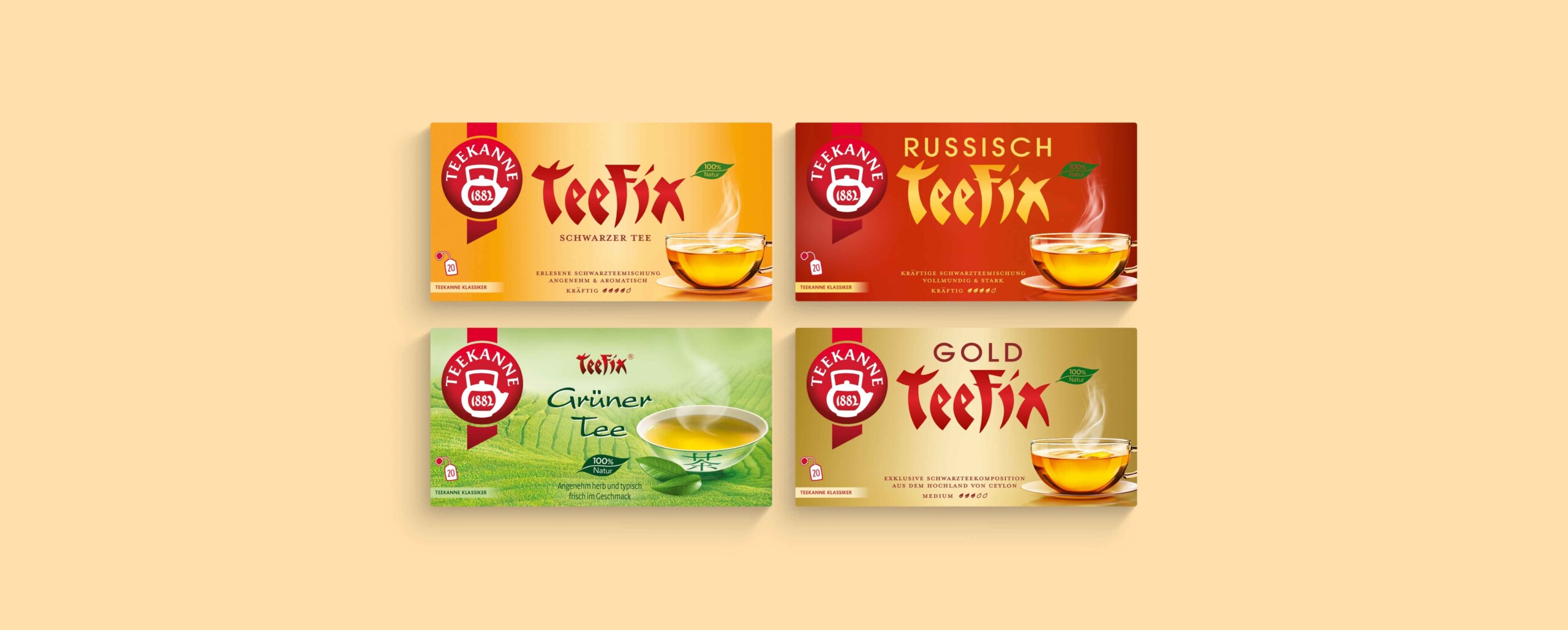 Vier Teefix-Teepackungen – Klassisch, Russisch, Grün und Gold – jede mit dem Bild einer dampfenden Teetasse.